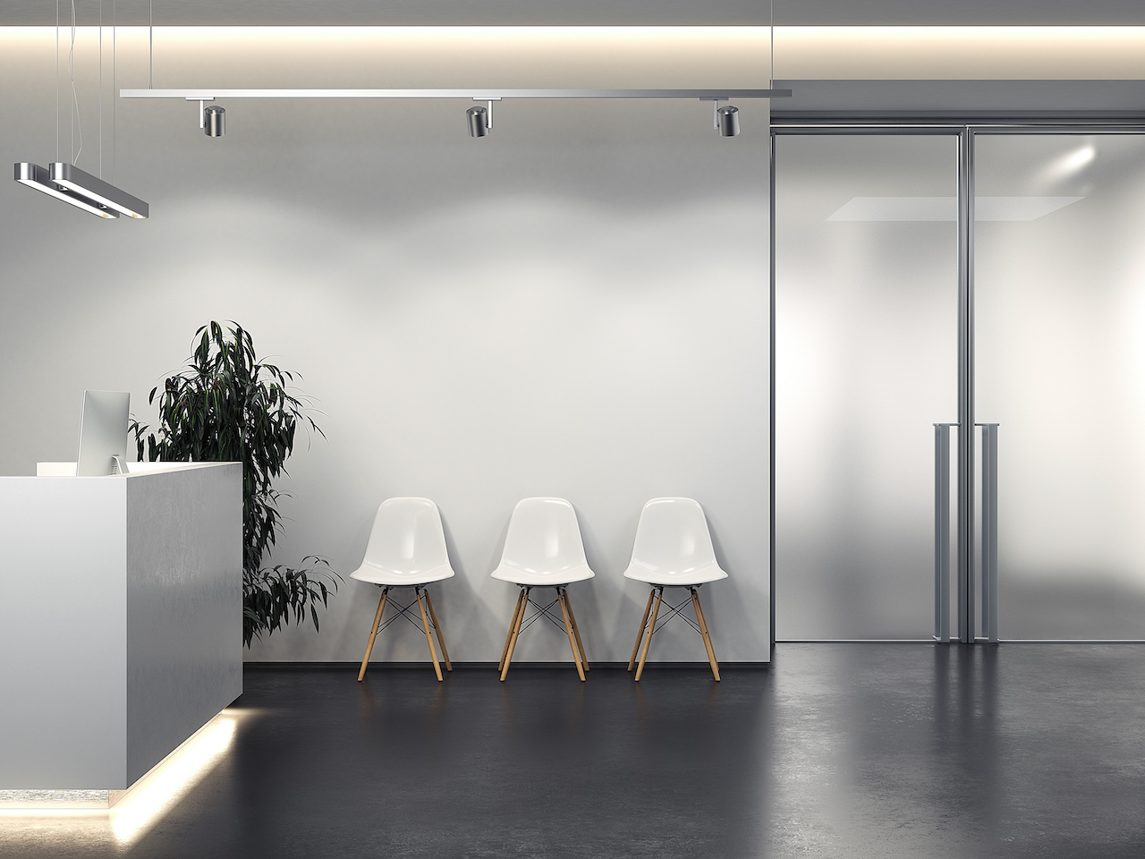 recepción de consultorio con 3 sillas blancas