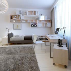 recamara alfombrada de ambiente juvenil