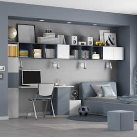 recamara minimalista juvenil con cama y computadora