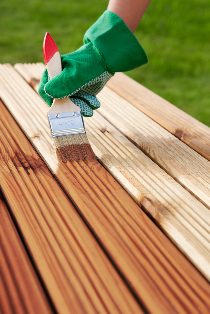 Deck painting and refinishing services in Katy, Texas.